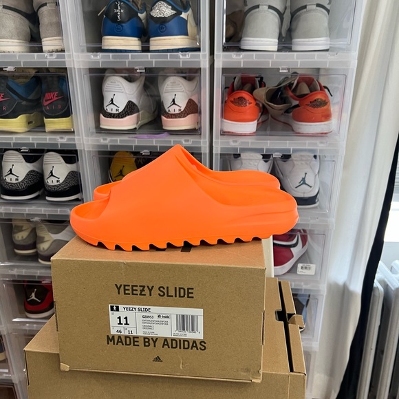 Yeezy slides. Enflame Orange. Hardest color to get. 100 percent authentic.